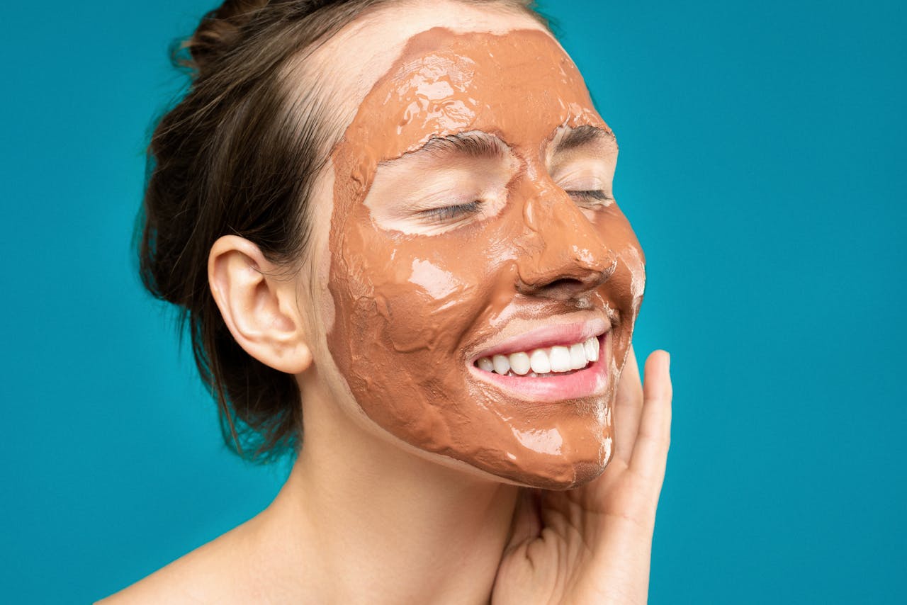 services-02 woman with clay mask on face 3762642